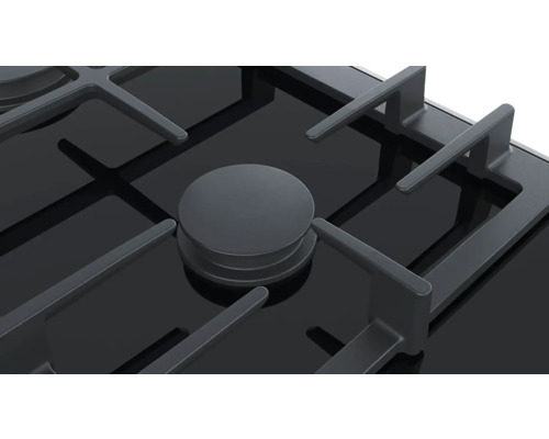 Detailansicht eines Gasherds mit Topfträger