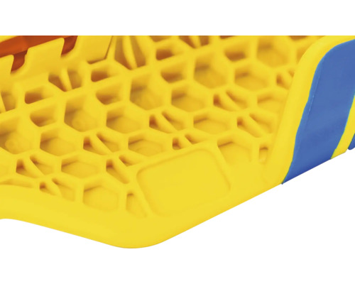 Detailansicht eines gelben Kunststoffprodukts mit Wabenstruktur