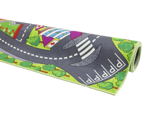 Spielteppich mit Stadtmotiv aufgerollt