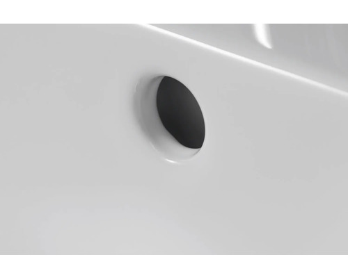 Detailansicht eines Waschbeckens mit Hahnloch