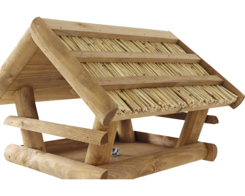 Vogelhaus aus Holz mit Strohdach