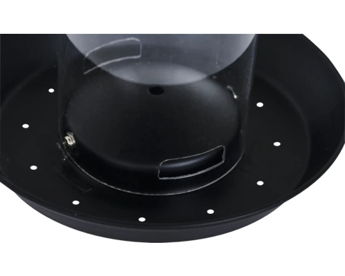 Detailaufnahme eines Vogelfutterhauses mit runder Basis