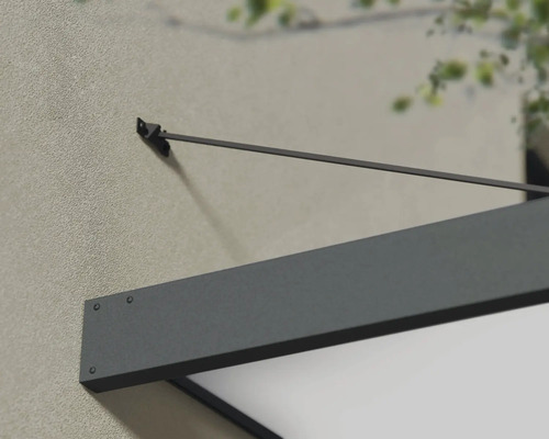 Detailaufnahme einer Haustürüberdachung an einer Hauswand