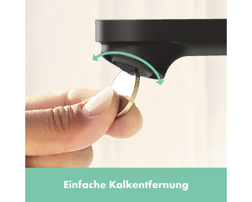 Demonstration of limescale removal from a tap with a coin.