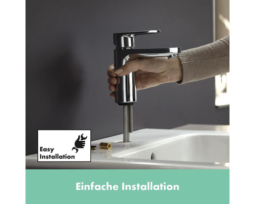 Installation einer Armatur am Waschbecken