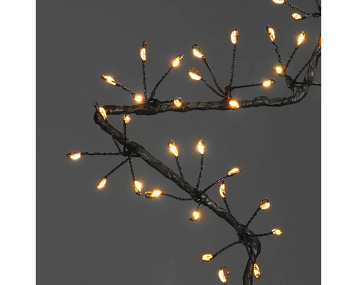Dekorative Lichterkette in Astform mit warmweißen LED-Leuchten