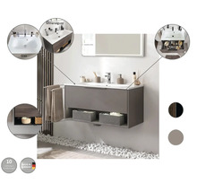 Badezimmer mit Waschbeckenunterschrank in Graubraun mit Handtüchern und Dekoration