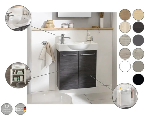 Badezimmer mit Waschbeckenunterschrank, Waschbecken und Armatur