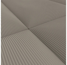 Nahaufnahme eines gesteppten Sofas mit Cordbezug