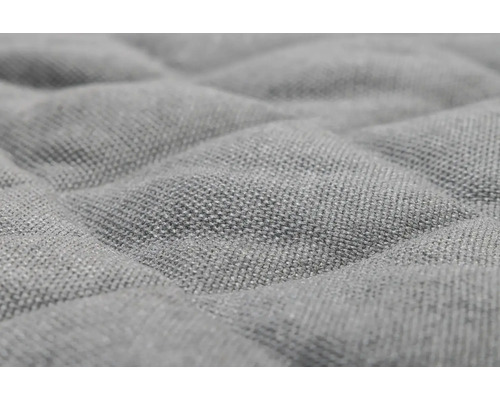 Nahaufnahme eines gesteppten Stoffes mit quadratischem Muster