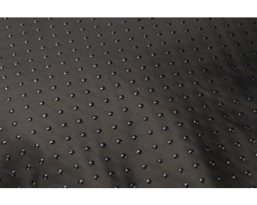 Detailansicht einer rutschfesten Unterlage mit Noppenstruktur.