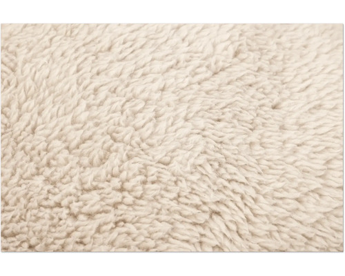 Nahaufnahme von beigem Teddyplüschstoff