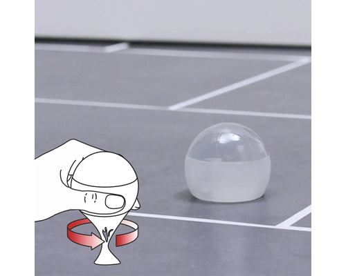 Illustration der Handhabung einer Dosierkugel mit Füllstandsanzeige.