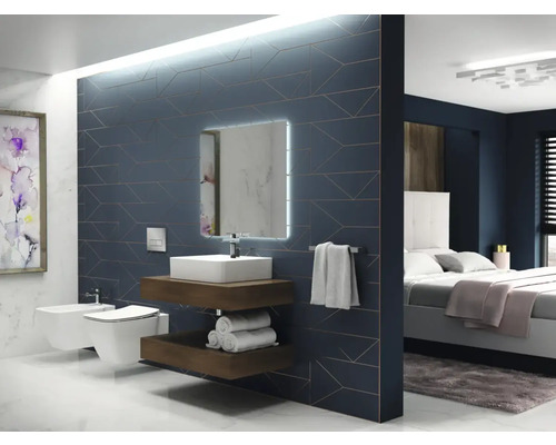 Modernes Badezimmer mit Waschtisch, Toilette, Bidet und angrenzendem Schlafzimmer