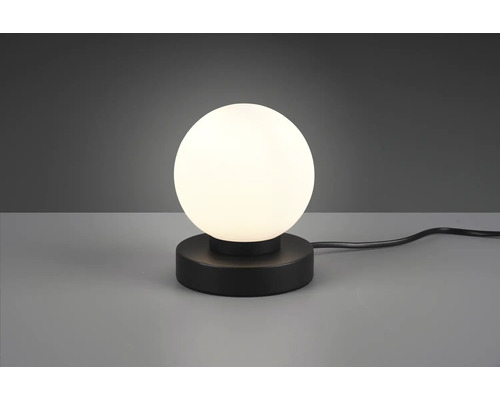 Tischleuchte mit kugelförmigem Lampenschirm