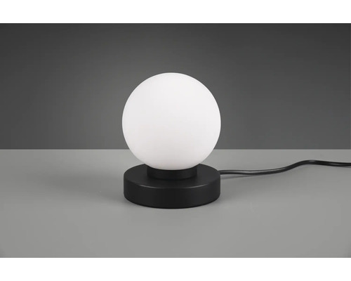 Tischleuchte mit kugelförmigem Lampenschirm