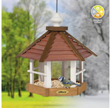 Vogelhaus mit Futter und Blaumeise