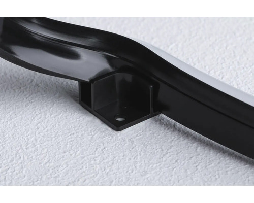 Detailaufnahme einer schwarzen Eckleiste mit Befestigung