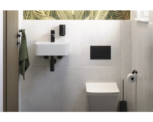 Modernes Badezimmer mit Waschbecken, Toilette und Accessoires