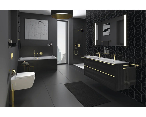 Modernes Badezimmer mit Badewanne, Dusche, Waschtisch und Toilette in dunklen Farbtönen.