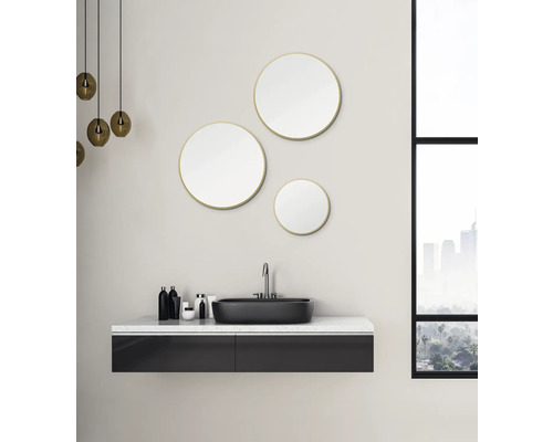 Modernes Badezimmer mit Waschbecken, Unterschrank und runden Spiegeln