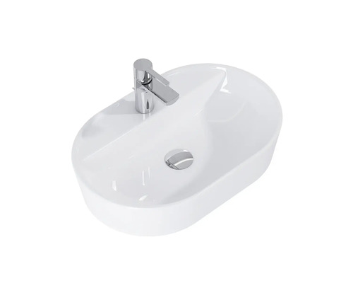 Waschbecken aus Keramik mit Armatur