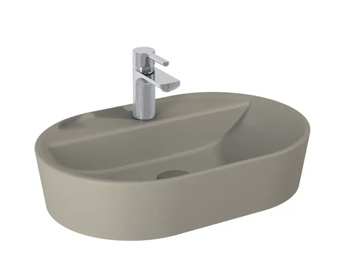 Aufsatzwaschbecken in ovaler Form mit Armatur