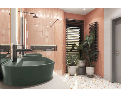 Helles Badezimmer mit Doppelwaschbecken, Armaturen, Heizkörper und Pflanzen