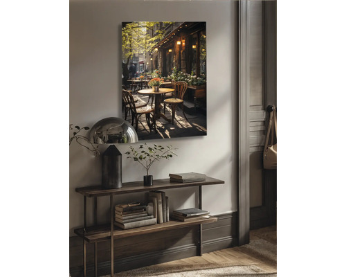 Wandbild mit Cafészenen über einem Konsolentisch im Wohnzimmer