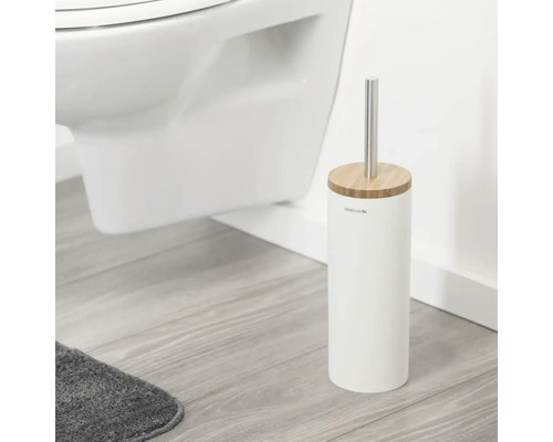 Toilettenbürste mit Behälter im Badezimmer