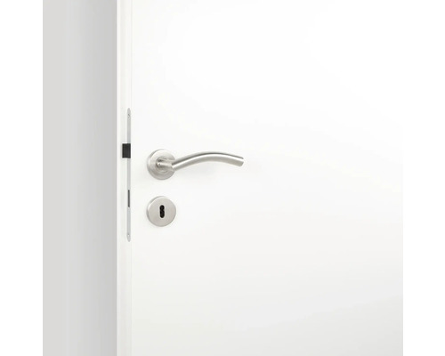 Weiße Innentür mit silberfarbener Türklinke und Schlüsselloch