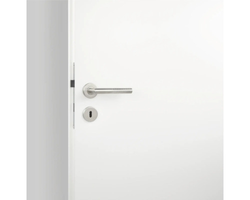 Weiße Innentür mit Türgriff und Schloss