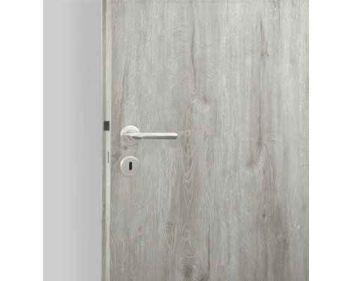 Graue Holztür mit silberfarbenem Griff