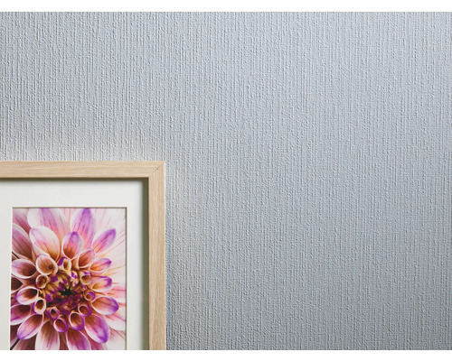 Nahaufnahme einer hellen Tapete mit feiner Struktur