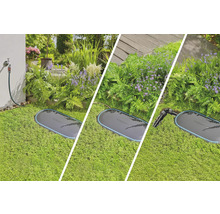 Gardena Pipeline Wasserdose im Garten mit Blumen und Rasen