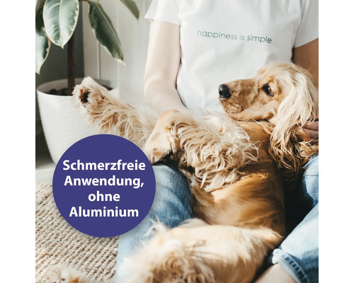 Frau hält Cocker Spaniel auf dem Schoß, mit Text: Schmerzfreie Anwendung, ohne Aluminium