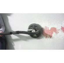Wandschleifer im Einsatz an einer Wand