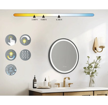 Runder Badezimmerspiegel mit LED-Beleuchtung, Touchfunktion, Dimmfunktion, Heizfunktion und Schutzart IP44 in einem Badezimmer