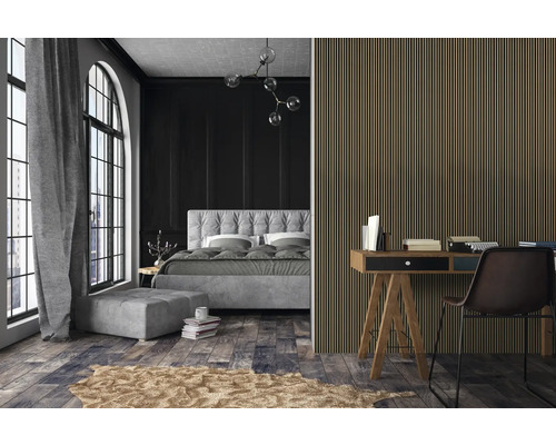 Schlafzimmer mit Bett, Schreibtisch und Holzpaneelwand