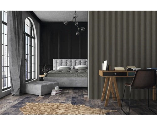 Schlafzimmer mit Bett, Schreibtisch und Wandpaneelen