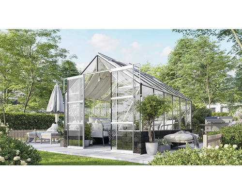 Gewächshaus mit Sitzbereich im Garten
