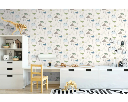 Kinderzimmer mit Dinosaurier Tapete, Schreibtisch und weißen Möbeln