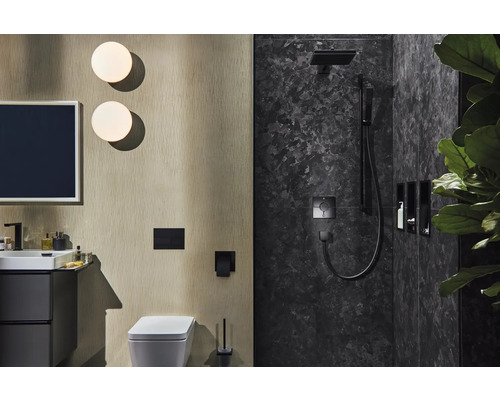 Modernes Badezimmer mit Waschbecken, Toilette und Dusche in dunklen Farbtönen