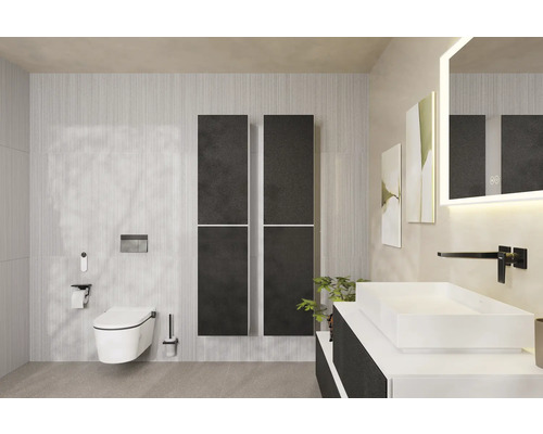 Modernes Badezimmer mit Toilette, Waschbecken und Heizkörper