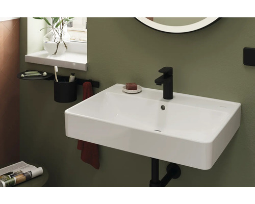 Badezimmerwaschbecken mit Armatur und Ablage für Badaccessoires