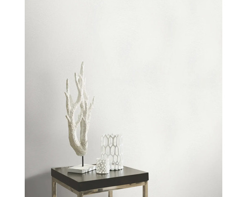 Dekorative Koralle, Vase und Teelichthalter auf einem Tisch