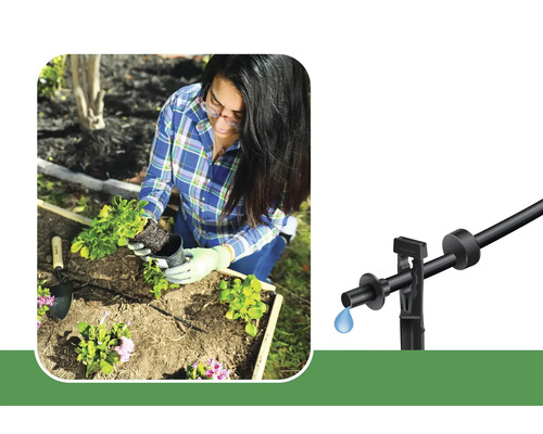 Frau pflanzt Blumen in einem Garten mit einem Tropfbewässerungssystem.