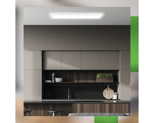 Moderne Küche mit Deckenleuchte, Schränken und Arbeitsfläche