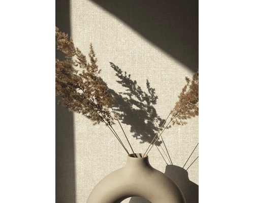 Dekorative getrocknete Gräser in einer keramischen Vase