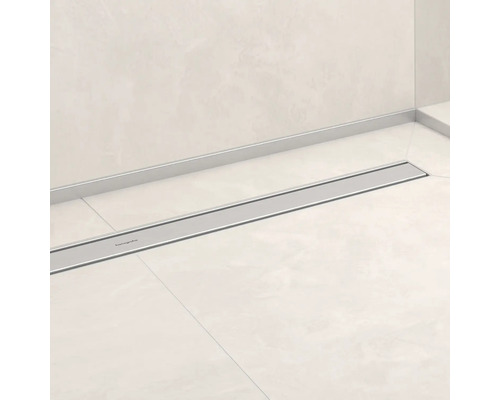 Duschrinne aus Edelstahl mit Hansgrohe Logo im Badezimmer